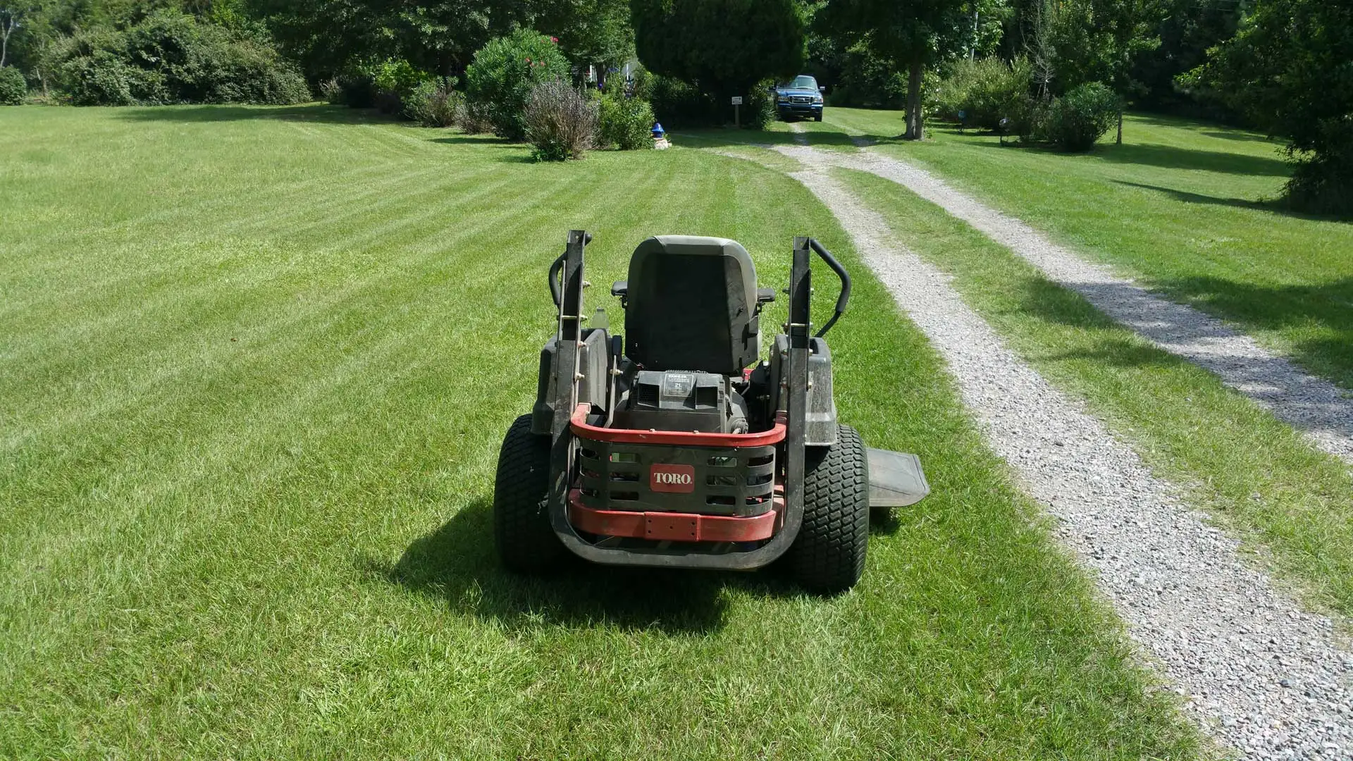 QuickCall Services lawn mower at a residential property in Martinez.