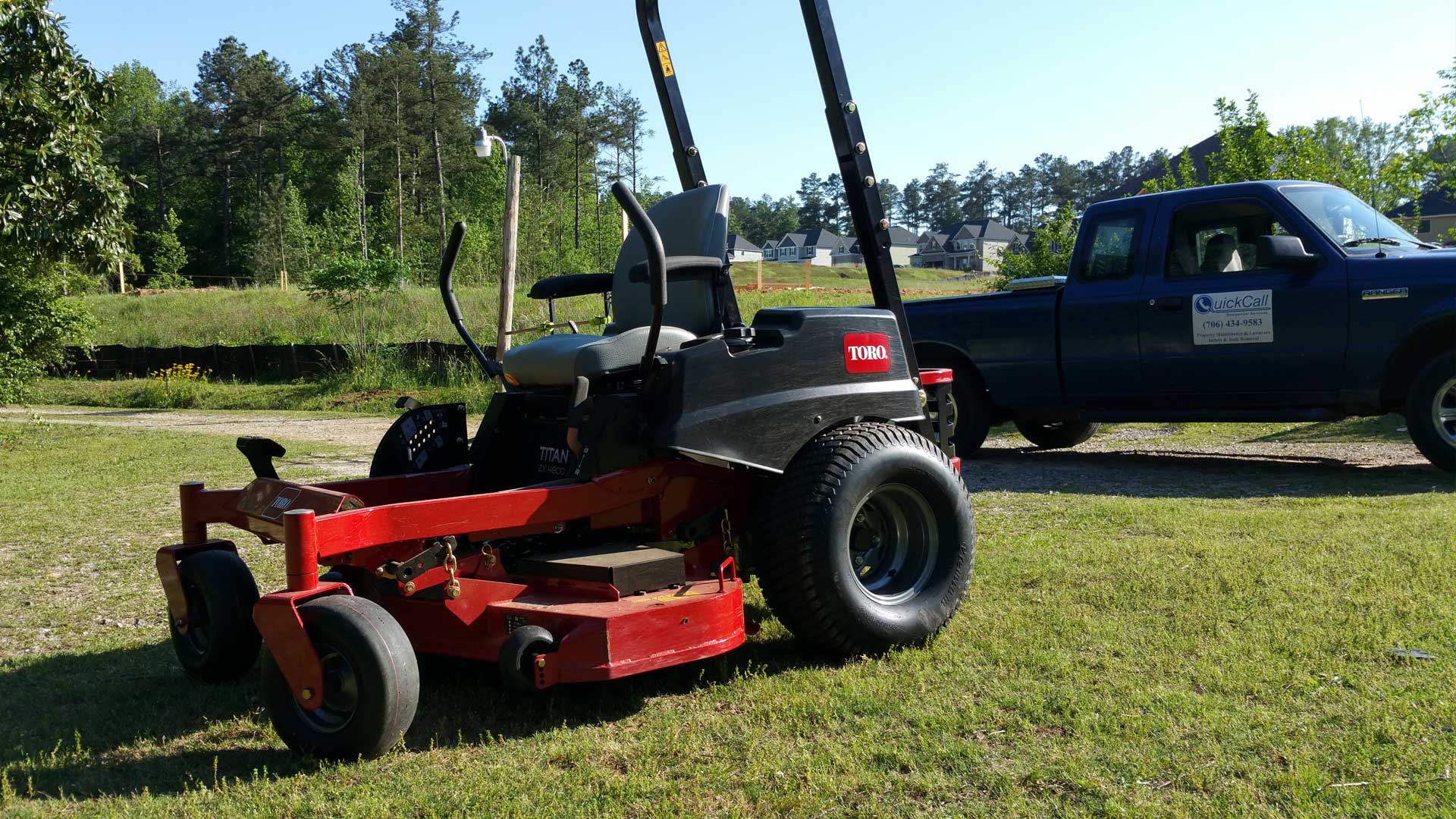 Quick Call lawn mower and truck, contact us today for lawn and landscape maintenance in Martinez.